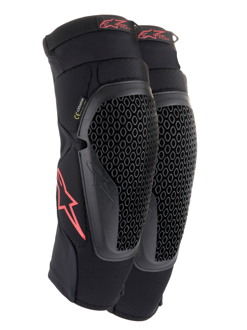 Genouillères Alpinestars Bionic Flex, noir et rouge, paire de protections de genoux pour motocross avec coques perforées technologie Nucleon Flex, logos Astars rouges et sangles élastiquées sur manchon en mesh noir respirant.