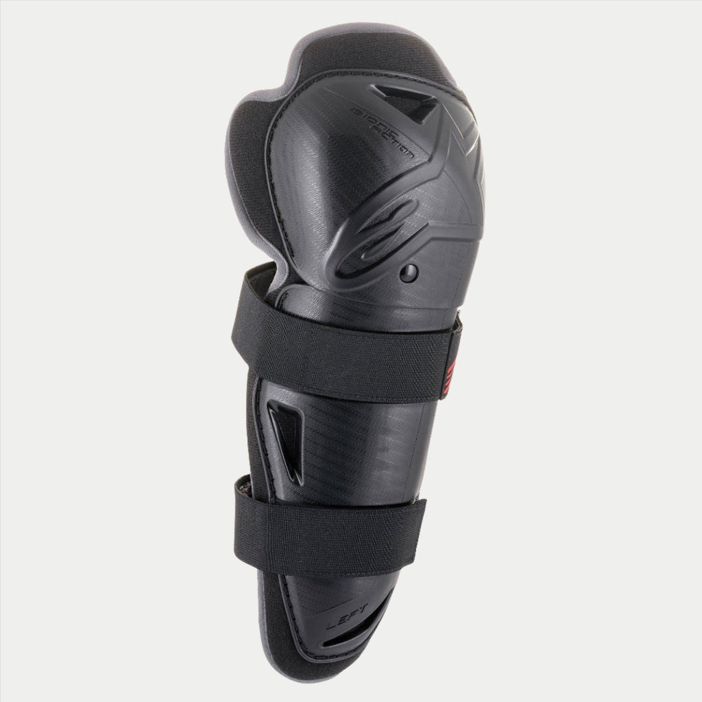 Genouillère Alpinestars Youth Bionic Action, noir, protection individuelle avec doubles sangles élastiques, coque en plastique asymétrique ergonomique avec logo embossé, équipement de protection de motocross et tout-terrain pour jeunes pilotes