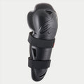 Genouillère Alpinestars Youth Bionic Action, noir, protection individuelle avec doubles sangles élastiques, coque en plastique asymétrique ergonomique avec logo embossé, équipement de protection de motocross et tout-terrain pour jeunes pilotes