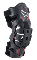 Orthèse de genou Alpinestars Bionic 5S Youth, protection de genou de motocross, noir et rouge, avec un logo étoile blanc, système de charnière articulé à quatre points, cadre en composite robuste avec sangles réglables, conçu pour la course tout-terrain pour les jeunes