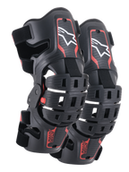 Genouillères Alpinestars Bionic 5S Junior, protection de genou motocross, noir et rouge, paire de protecteurs avec design de cadre hybride et coques ventilées, logo Astar blanc sur la partie supérieure, marquage ASTARS rouge sur la partie inférieure et sangles noires réglables pour un ajustement sûr.