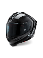 Casque Alpinestars Supertech R10 Solid, casque de course moto, carbone noir mat et brillant, avec trame de fibre de carbone apparente, visière teintée sombre, logos Astars blancs, design aérodynamique épuré