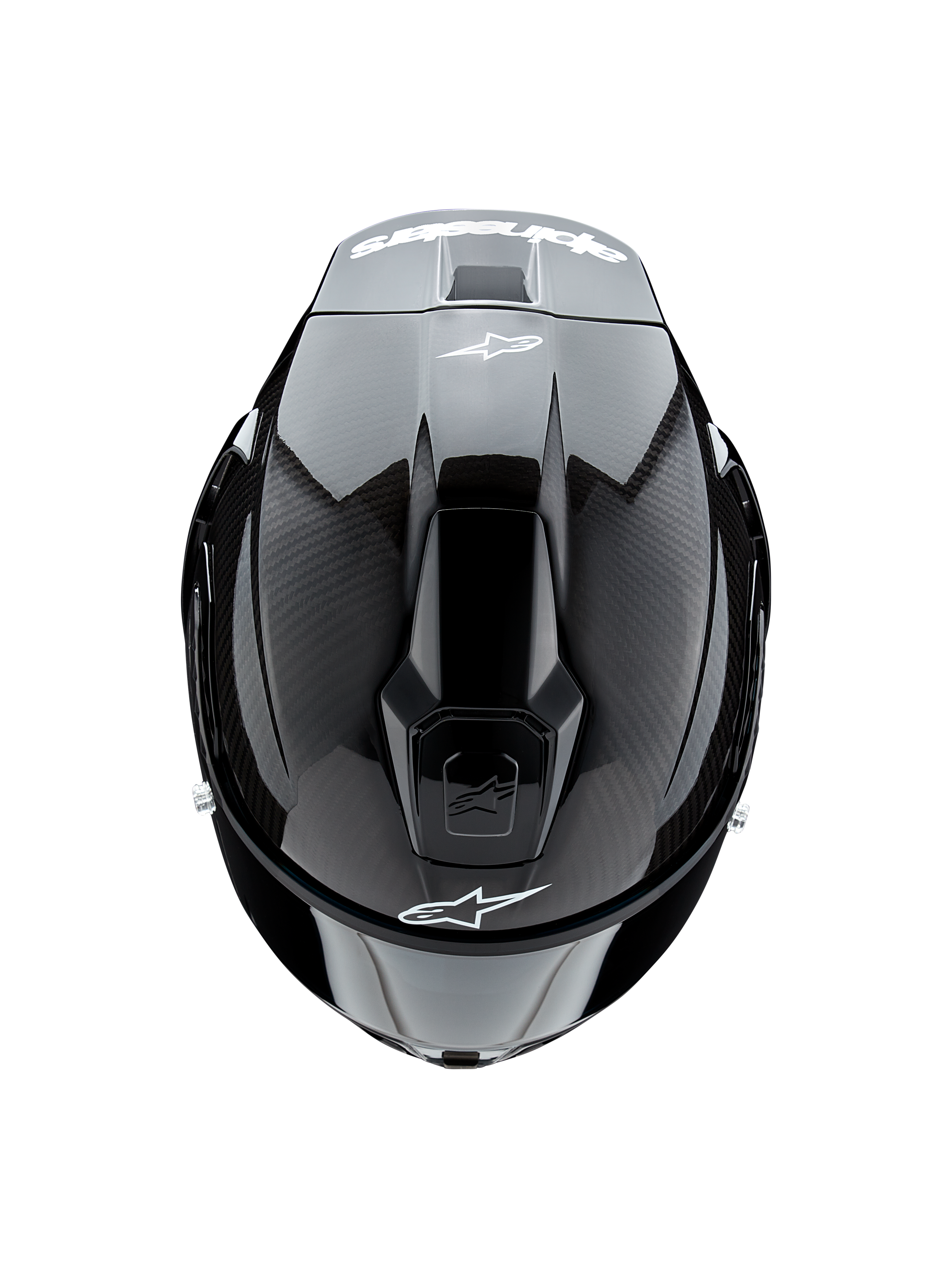 Casque Alpinestars Supertech R10 Solid, vue de dessus, carbone noir mat et brillant, montrant la texture de la fibre de carbone sur les côtés, la section centrale brillante, les ventilations aérodynamiques et le logo Alpinestars blanc à l'avant et à l'arrière