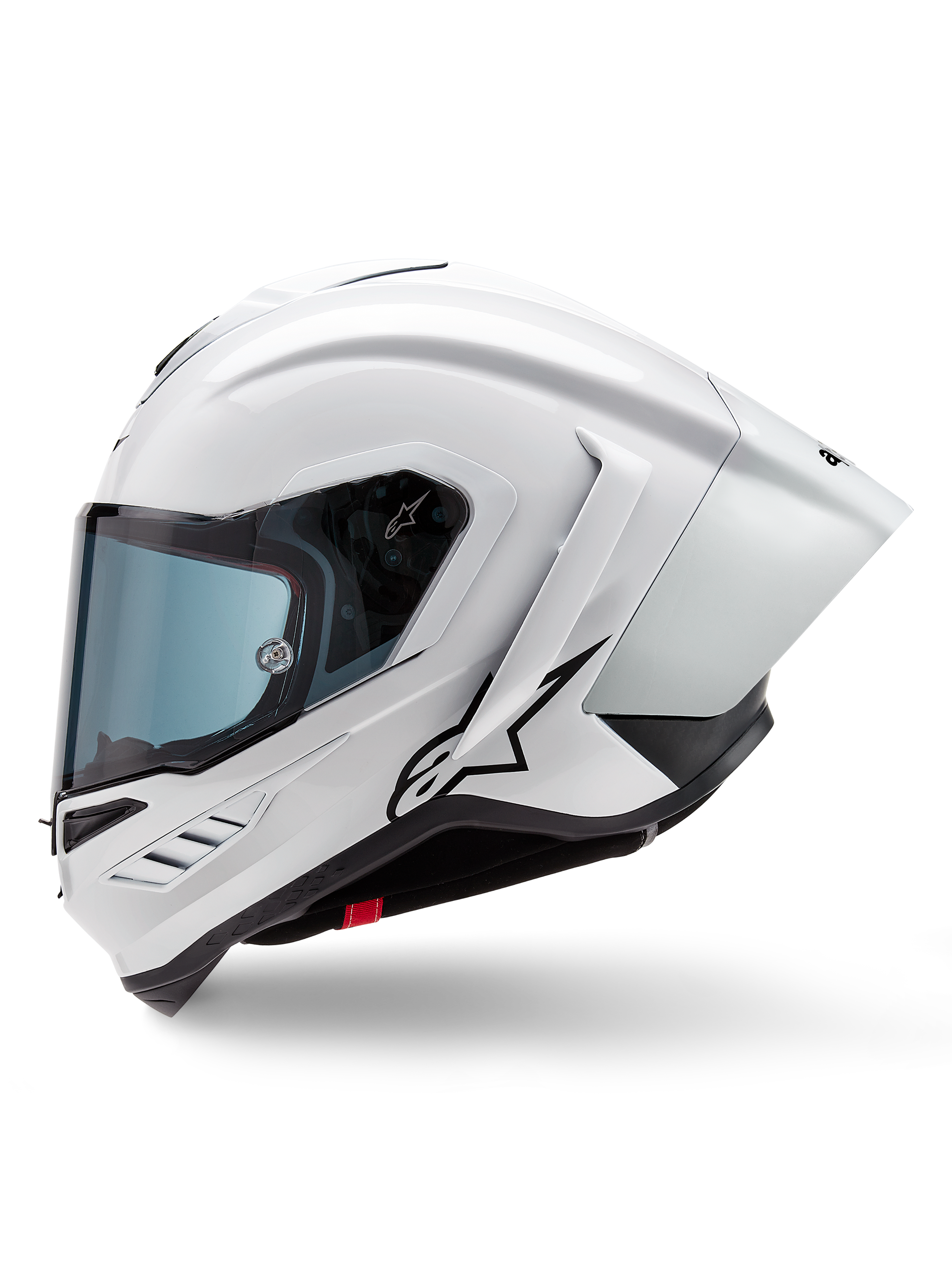Casque Alpinestars Supertech R10 Solid, casque intégral de course, blanc brillant et noir mat, vue de profil avec spoiler aérodynamique intégré, visière teintée et logo étoile Alpinestars noir