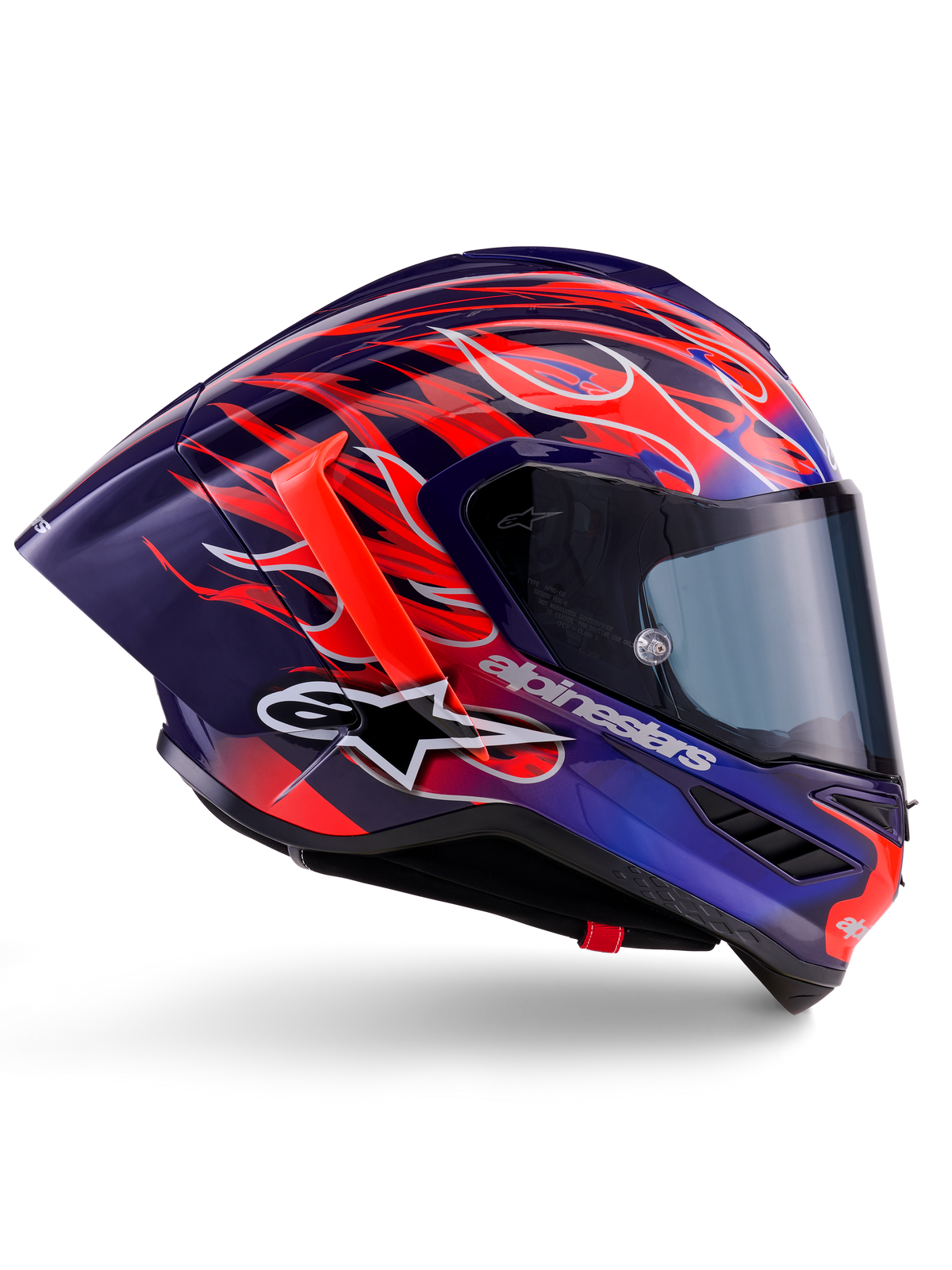 Casque Alpinestars Supertech R10 Édition Limitée Flyte, Purple Red Glossy, casque intégral de moto présentant une base bleu profond et violette avec des motifs de flammes orange et rouge éclatants, profil aérodynamique avec un aileron arrière rouge et une visière fumée foncée, équipement de course professionnel
