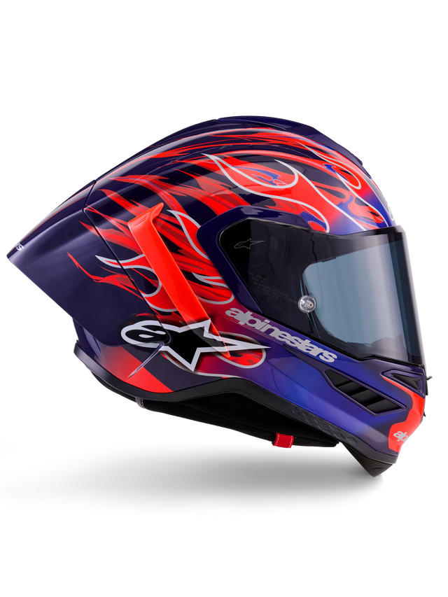 Casque Alpinestars Supertech R10 Édition Limitée Flyte, Purple Red Glossy, casque intégral de moto présentant une base bleu profond et violette avec des motifs de flammes orange et rouge éclatants, profil aérodynamique avec un aileron arrière rouge et une visière fumée foncée, équipement de course professionnel