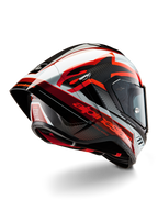 Casque Alpinestars Supertech R10 Team, casque de course intégral, noir carbone, rouge et blanc brillant, design aérodynamique avec spoiler arrière et texture en fibre de carbone apparente, avec logos Alpinestars distinctifs et étiquette de certification DOT