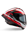 Casque Alpinestars Supertech R10 Team, casque de moto racing, carbone noir avec graphismes brillants rouges et blancs, vue de profil aérodynamique avec visière sombre, détails en fibre de carbone et logos rouges vifs, équipement de course haute performance