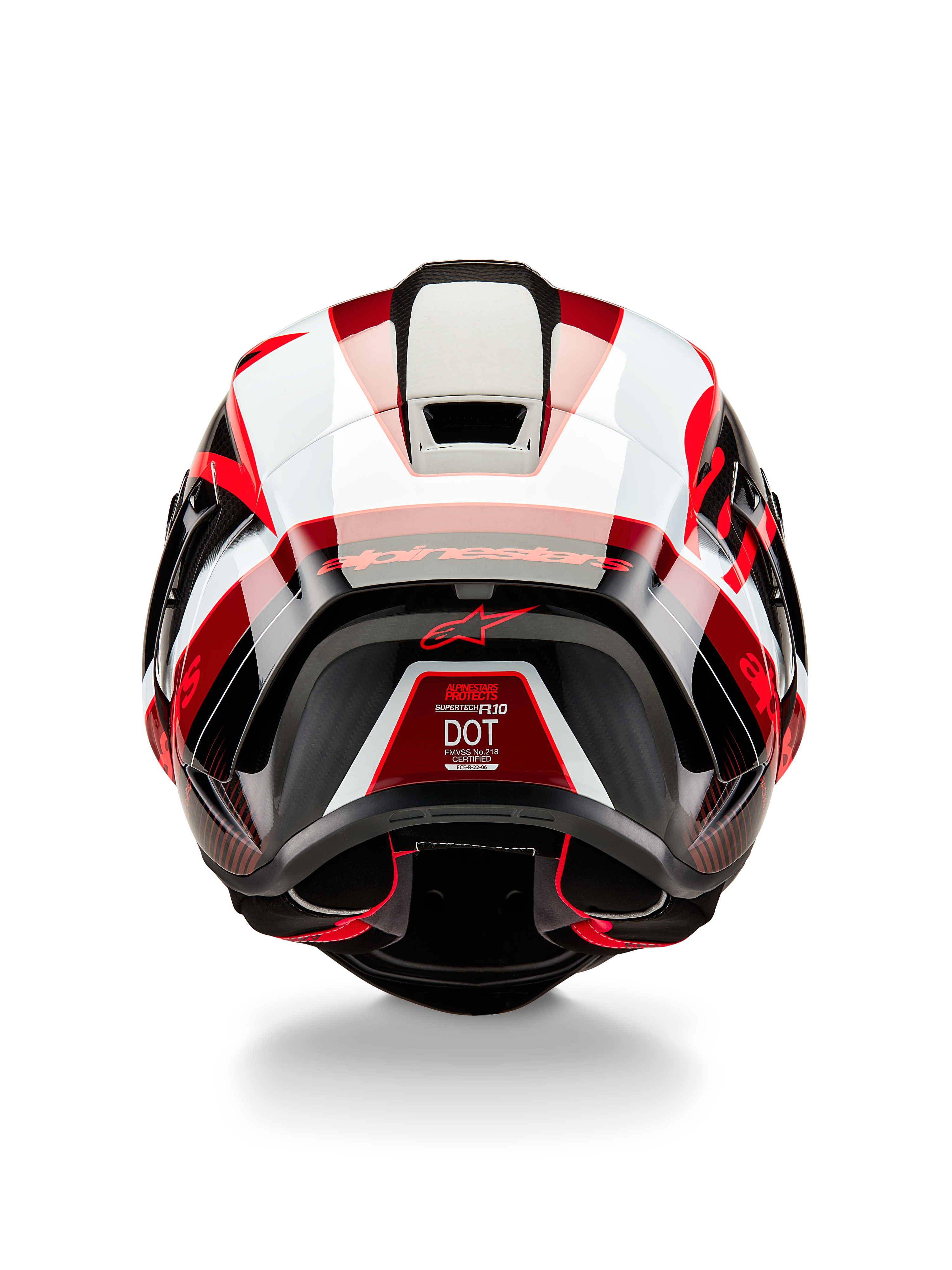 Casque Alpinestars Supertech R10 Team, vue arrière, noir carbone, rouge et blanc brillant, calotte au design aérodynamique avec des panneaux rouges et blancs vifs, marquage Alpinestars sur le spoiler et logo étoile rouge, casque de moto de course professionnel