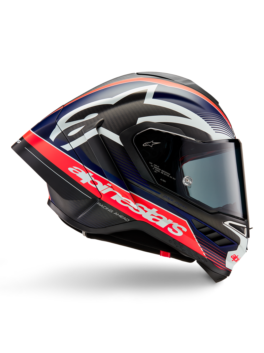 Casque Alpinestars Supertech R10 Team, casque de moto de course, carbone noir avec accents rouge fluo et bleu mat, larges logos Alpinestars blancs, design aérodynamique avec spoilers intégrés, écran transparent, texture de fibre de carbone apparente, profil de course épuré