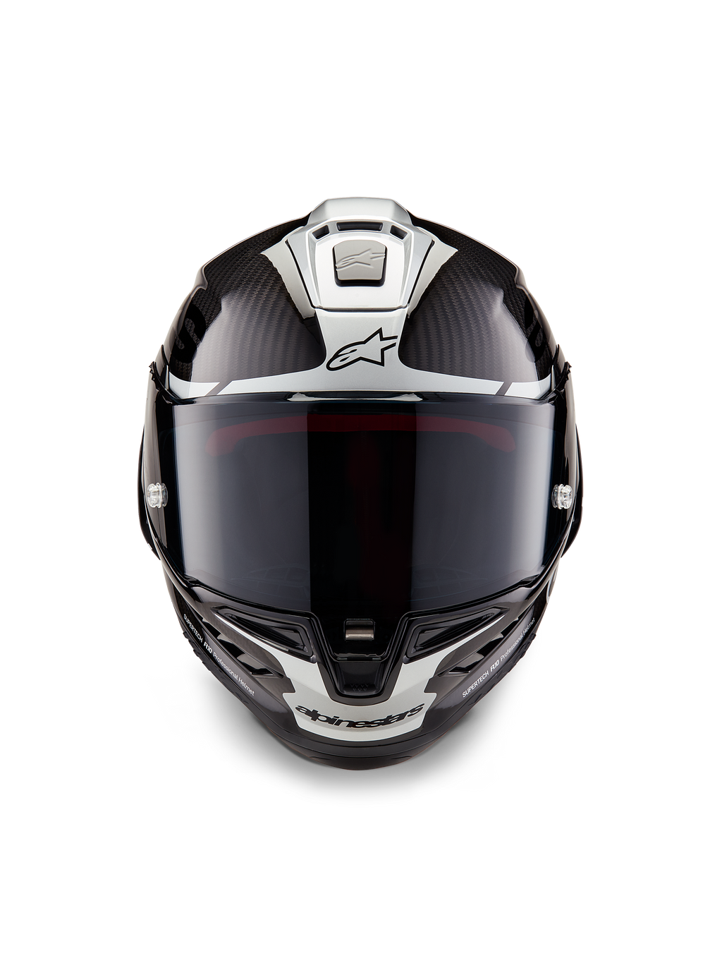 Casque Alpinestars Supertech R10 Element, casque intégral de course, noir carbone argent noir brillant, vue de face montrant la visière fumée foncée et la structure en fibre de carbone brillante avec des graphismes aérodynamiques argentés et les logos Alpinestars