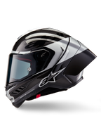 Casque Alpinestars Supertech R10 Element, casque de moto intégral de course, noir carbone argenté et noir brillant, vue de profil montrant le tissage en fibre de carbone et le spoiler arrière aérodynamique, design épuré avec marquage Alpinestars et finition de course professionnelle