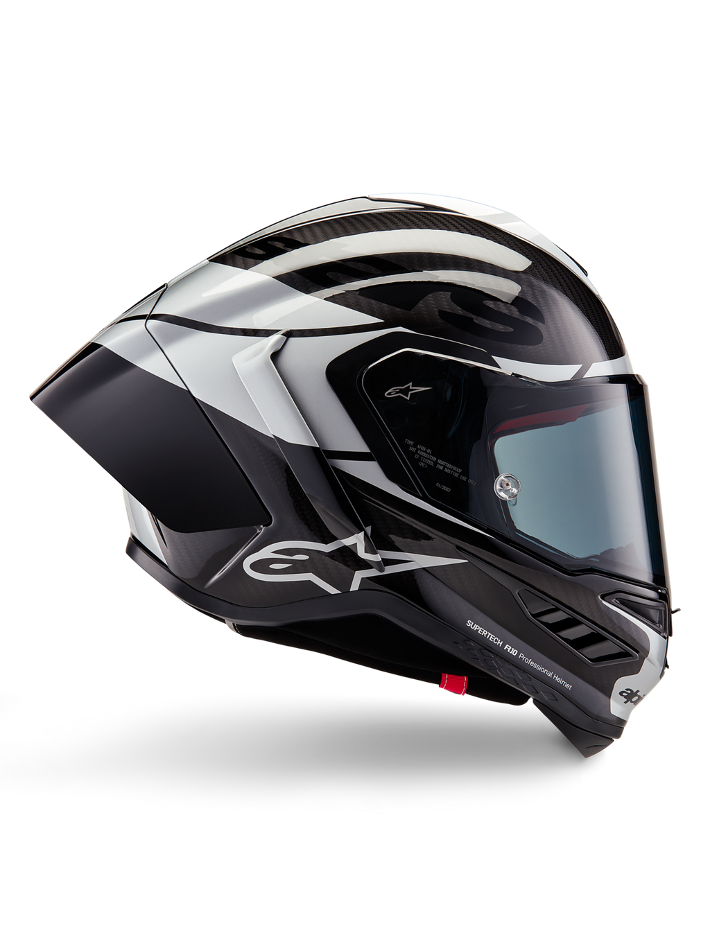 Casque Alpinestars Supertech R10 Element, casque intégral de course moto, finition carbone noir, argent et noir brillant, vue de profil avec coque aérodynamique en fibre de carbone, visière transparente et logo Alpinestars distinctif