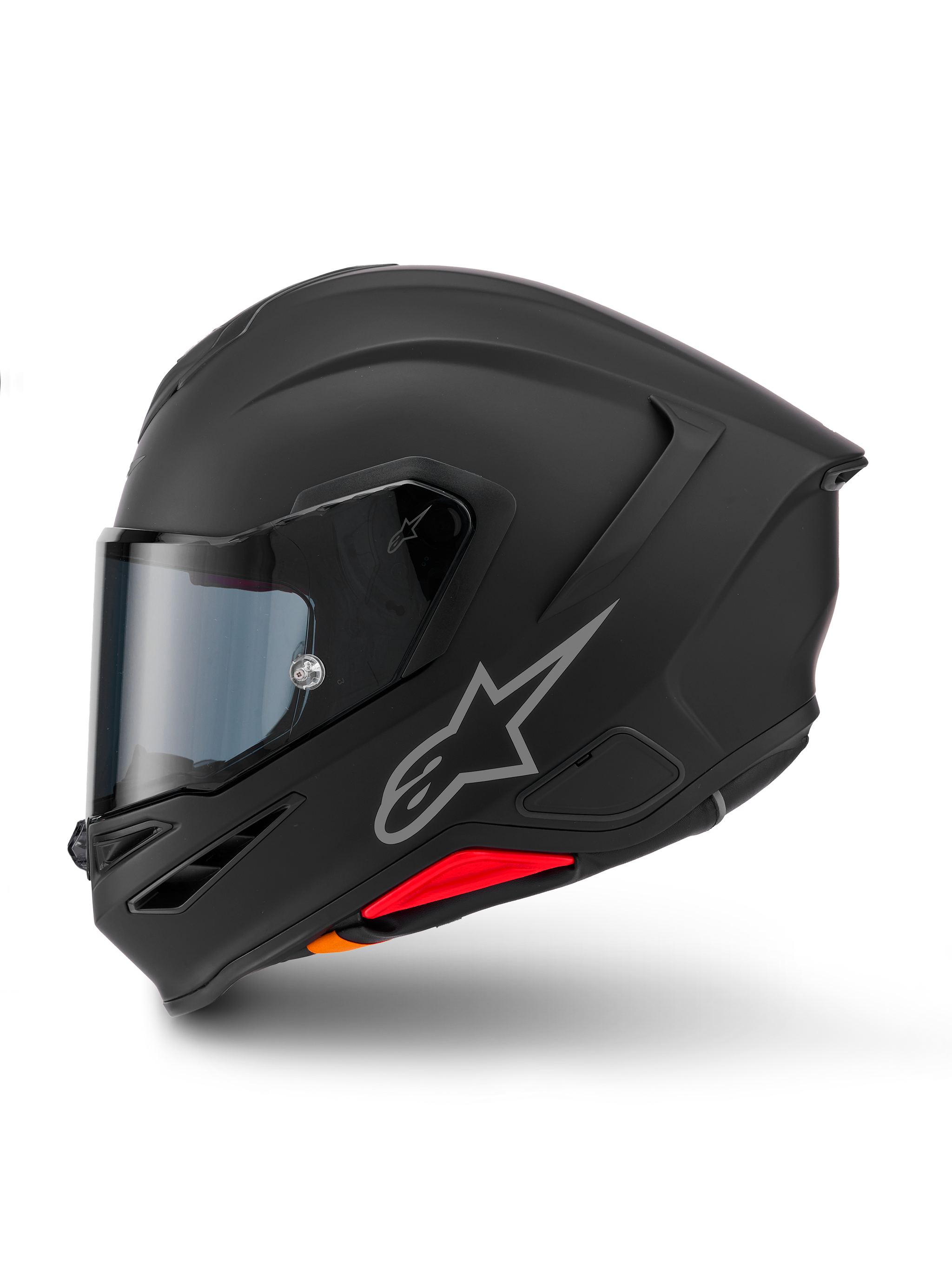 Casque Alpinestars S-R7 Solid, casque de moto intégral, noir mat, vue de profil, avec logo Astars argenté sur le côté, design aérodynamique avec spoiler intégré et ventilations de mentonnière, et accents rouges et orange à la base.