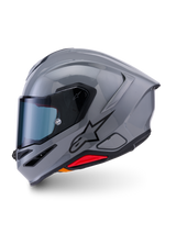 Alpinestars S-R7 Solid Helmet, full-face motorcycle helmet, Gray Glossy, side profile showing sleek aerodynamic design with integrated spoiler, black star logo, and red accent at the base