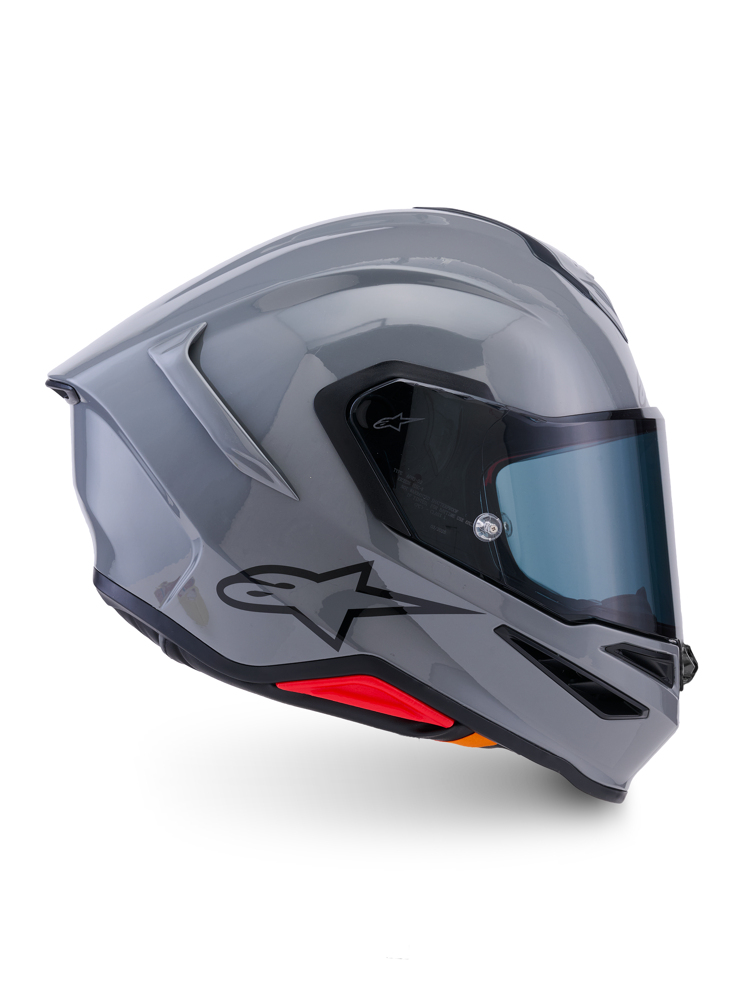 Casque Alpinestars S-R7 Solid, casque de moto intégral, gris brillant, vue de profil, coque aérodynamique gris brillant avec logo noir et accents rouges à la base, équipement de haute performance pour la course et la conduite sportive