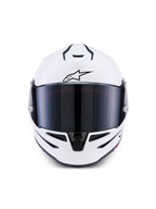 Casque Alpinestars S-R7 Solid, casque de moto intégral, blanc brillant, vue de face avec visière teintée foncée, coque aérodynamique avec aérations intégrées, équipement professionnel de course et de sport