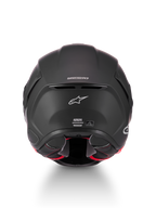 Casque S-R7 Solid d'Alpinestars, casque de moto racing noir mat, vue de dos montrant le logo Supertech R7, l'évacuation de ventilation et les étiquettes de certification