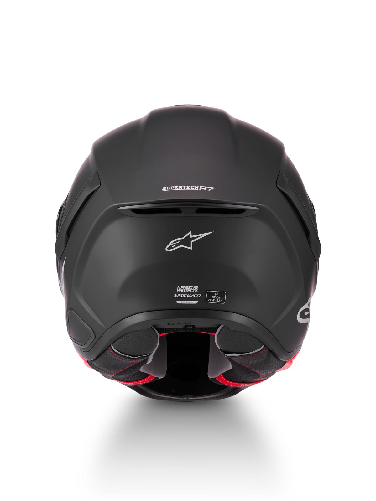 Casque S-R7 Solid d'Alpinestars, casque de moto racing noir mat, vue de dos montrant le logo Supertech R7, l'évacuation de ventilation et les étiquettes de certification