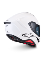 Alpinestars Casque S-R7 Solid, casque de moto racing blanc brillant, vue de profil latéral arrière montrant la coque aérodynamique en composite de carbone, le logo A-star noir et les détails de certification ECE 22.06