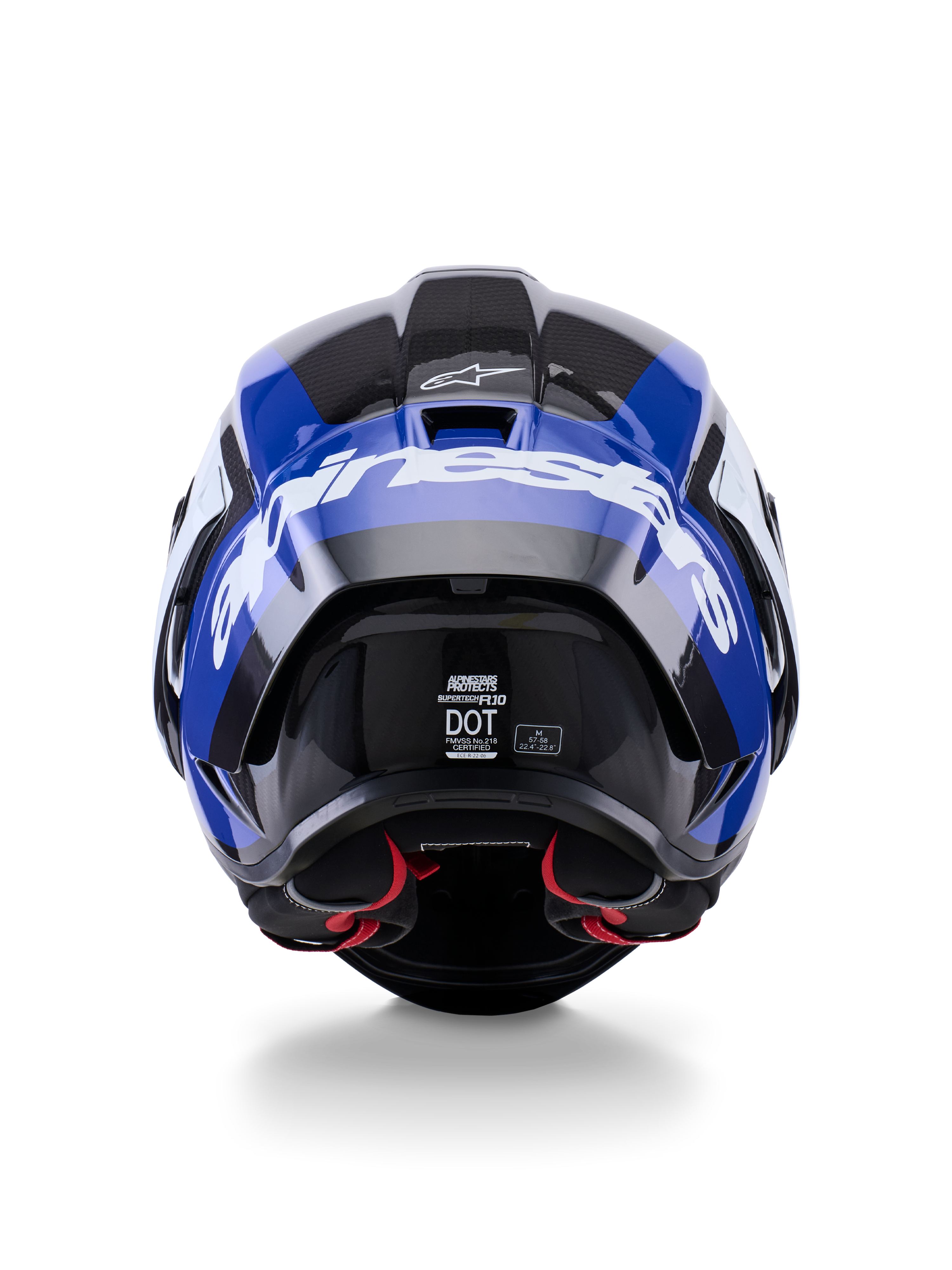 Casque Alpinestars Supertech R10 Arius, vue arrière, noir, blanc et bleu brillant, construction en fibre de carbone avec logo blanc imposant, forme aérodynamique, étiquette de certification DOT, rembourrage intérieur rouge