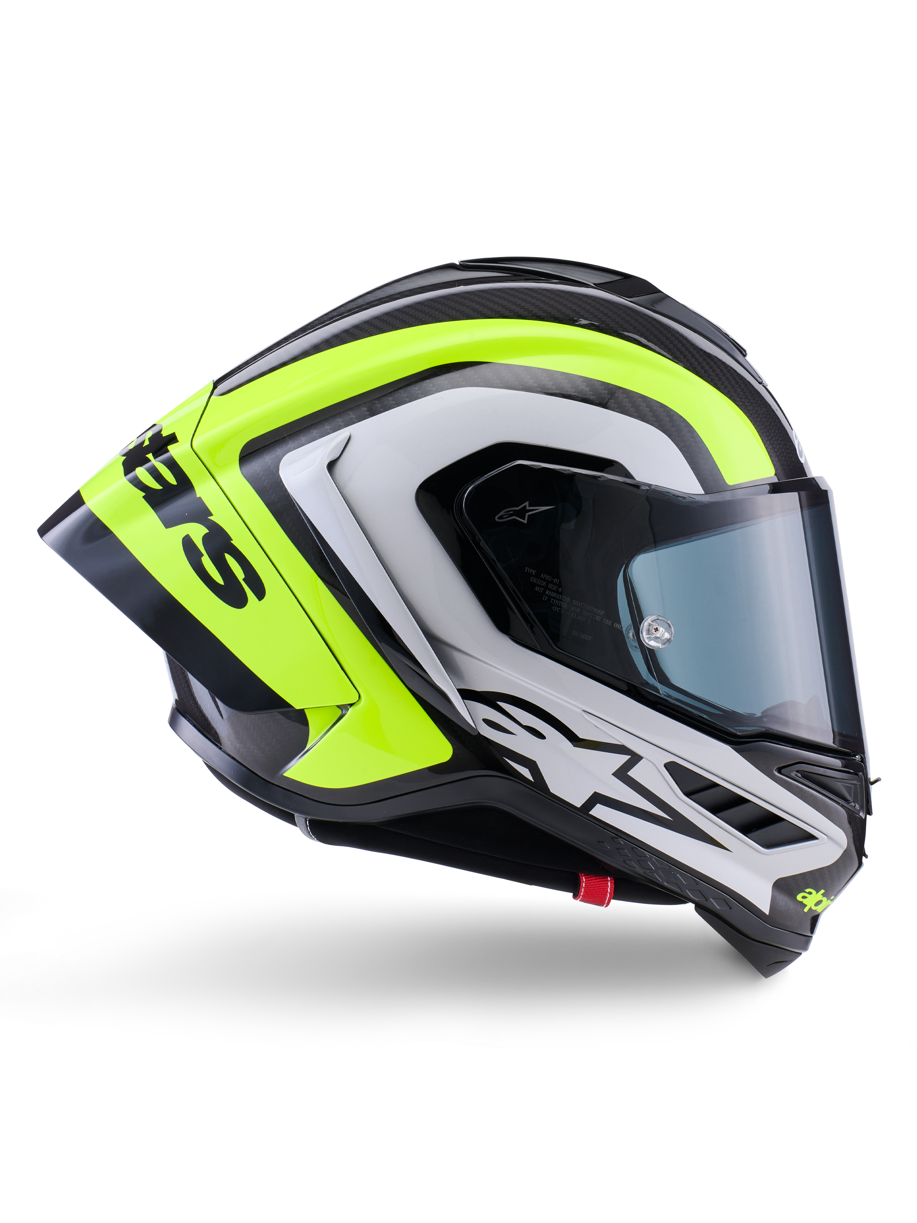 Casque Alpinestars Supertech R10 Arius, casque intégral de course, noir, argent et jaune fluo brillant, vue de profil montrant la coque aérodynamique et l'écran fumé foncé, construction en fibre de carbone avec marquage distinctif