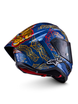 Casque Alpinestars Supertech R10 Martinator Thai bleu brillant, motifs mandalas dorés et spoiler arrière.