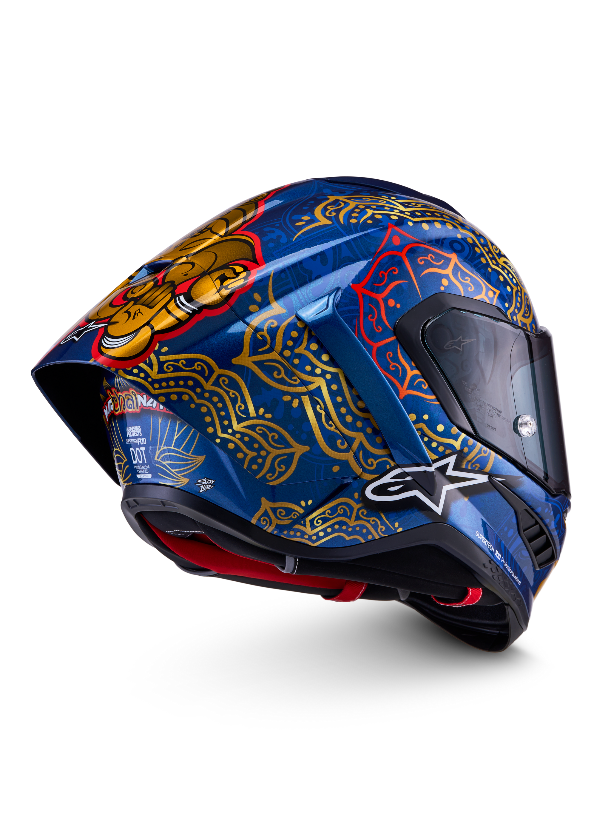 Casque Alpinestars Supertech R10 Martinator Thai bleu brillant, motifs mandalas dorés et spoiler arrière.