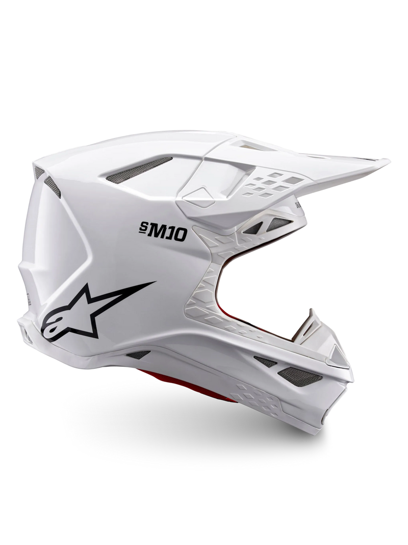 Casque Alpinestars Supertech M10 Solid ECE 22.06, casque de motocross blanc brillant avec logo noir, visière et conception intégrale ventilée, vue de profil