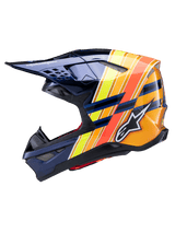 Casque Alpinestars Supertech M10 TLD Edition 25, profil latéral, bleu foncé brillant avec rayures graphiques orange vif, jaunes et rouge fluorescent, logo Alpinestars blanc et marquage Troy Lee Designs, casque de motocross haute performance pour le tout-terrain