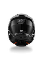 Alpinestars S-M3 Solid Helmet, Motocross Helmet, Glossy Black finish, rear view featuring white Alpinestars logo, ECE 22.06 certification label, and aerodynamic shell with exhaust ports