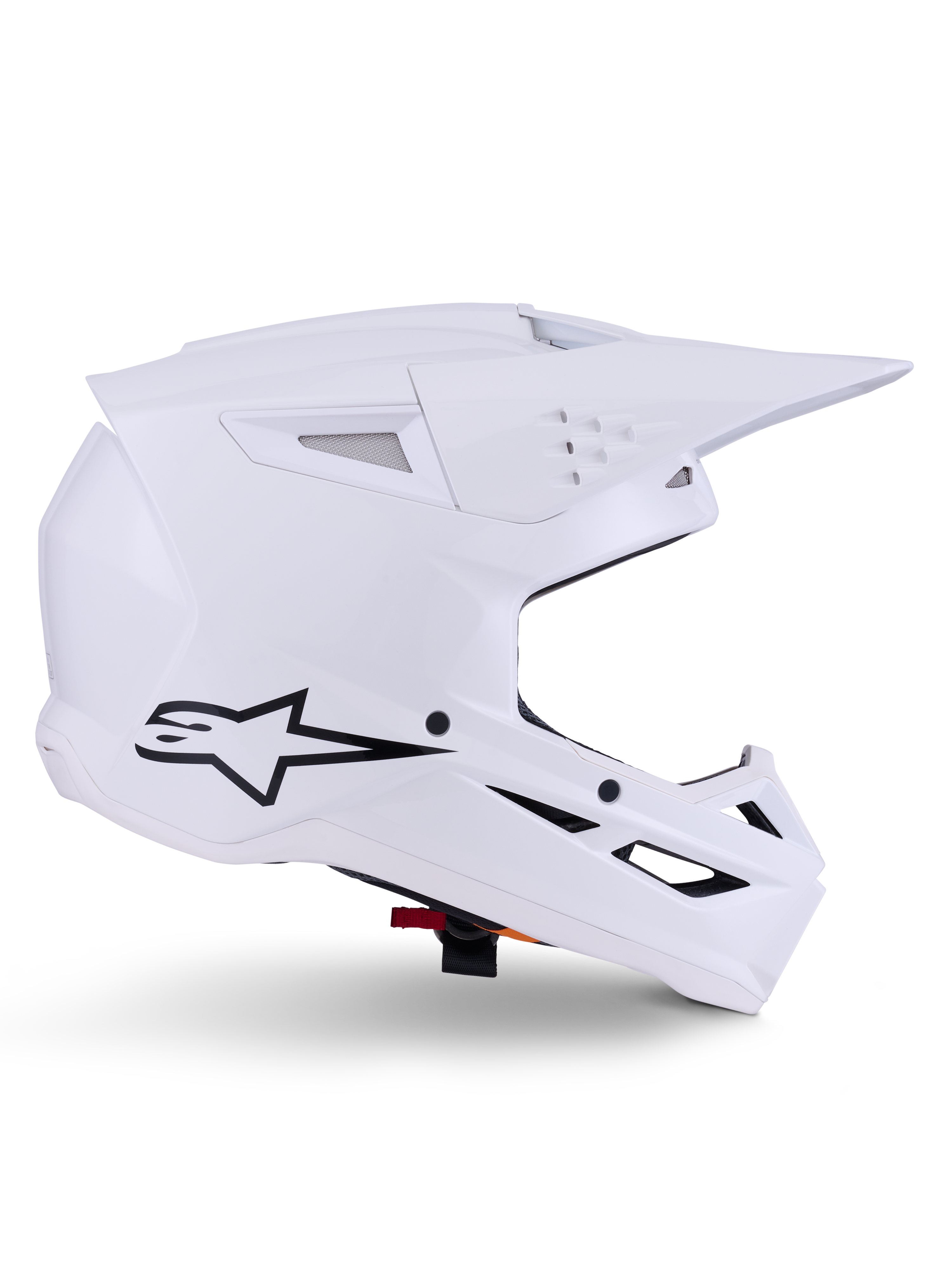 Casque Alpinestars S-M3 Solid, casque de motocross, blanc brillant, vue de profil avec logo étoile noir, coque aérodynamique angulaire, multiples aérations, visière et mentonnière intégrées, protection de course tout-terrain