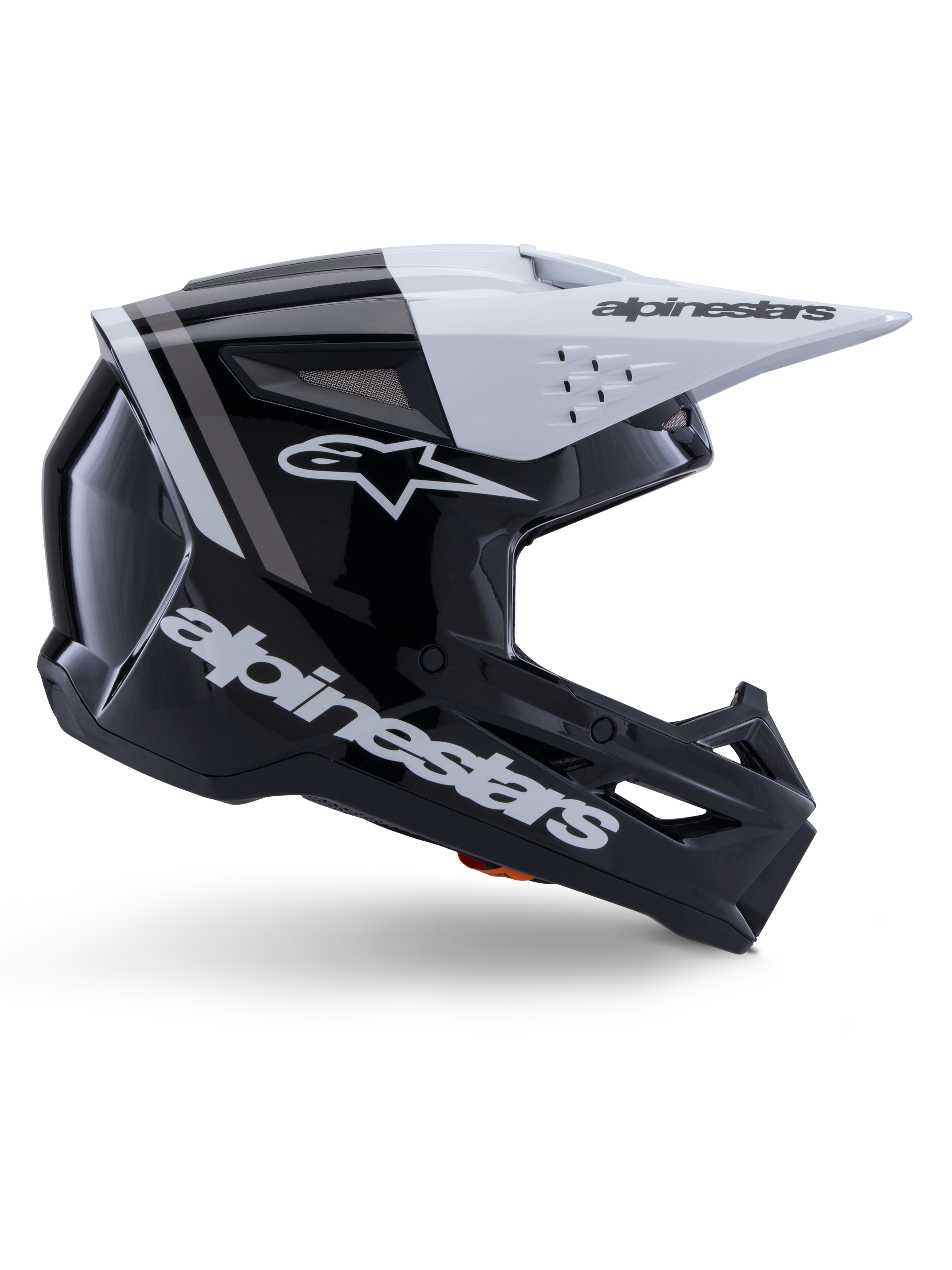 Casque Alpinestars S-M3 Radium, casque de motocross tout-terrain, noir, blanc et gris brillant, design aérodynamique angulaire avec ports de ventilation, vue de profil, finition brillante avec bandes grises et visière blanche avec logo Alpinestars