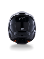 Alpinestars S-M3 Radium Helmet ECE 22.06, Motocross Helmet, Black White Gray Glossy, rear view showing glossy black finish, Alpinestars star logo, ventilation exhaust ports, and ECE certification label.