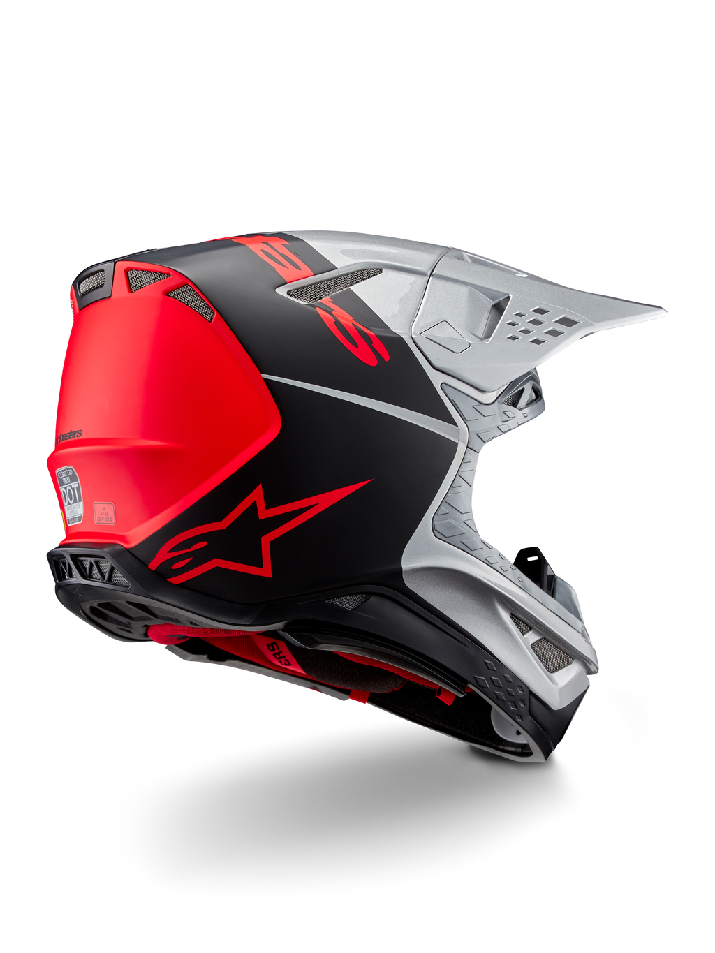 Alpinestars Supertech M10 Flood ECE 22.06 Helmet, Motocross Helmet, Silver, Black, and Orange Fluo, rear-side view highlighting aerodynamic shell design, ventilation ports, and matte-glossy finish