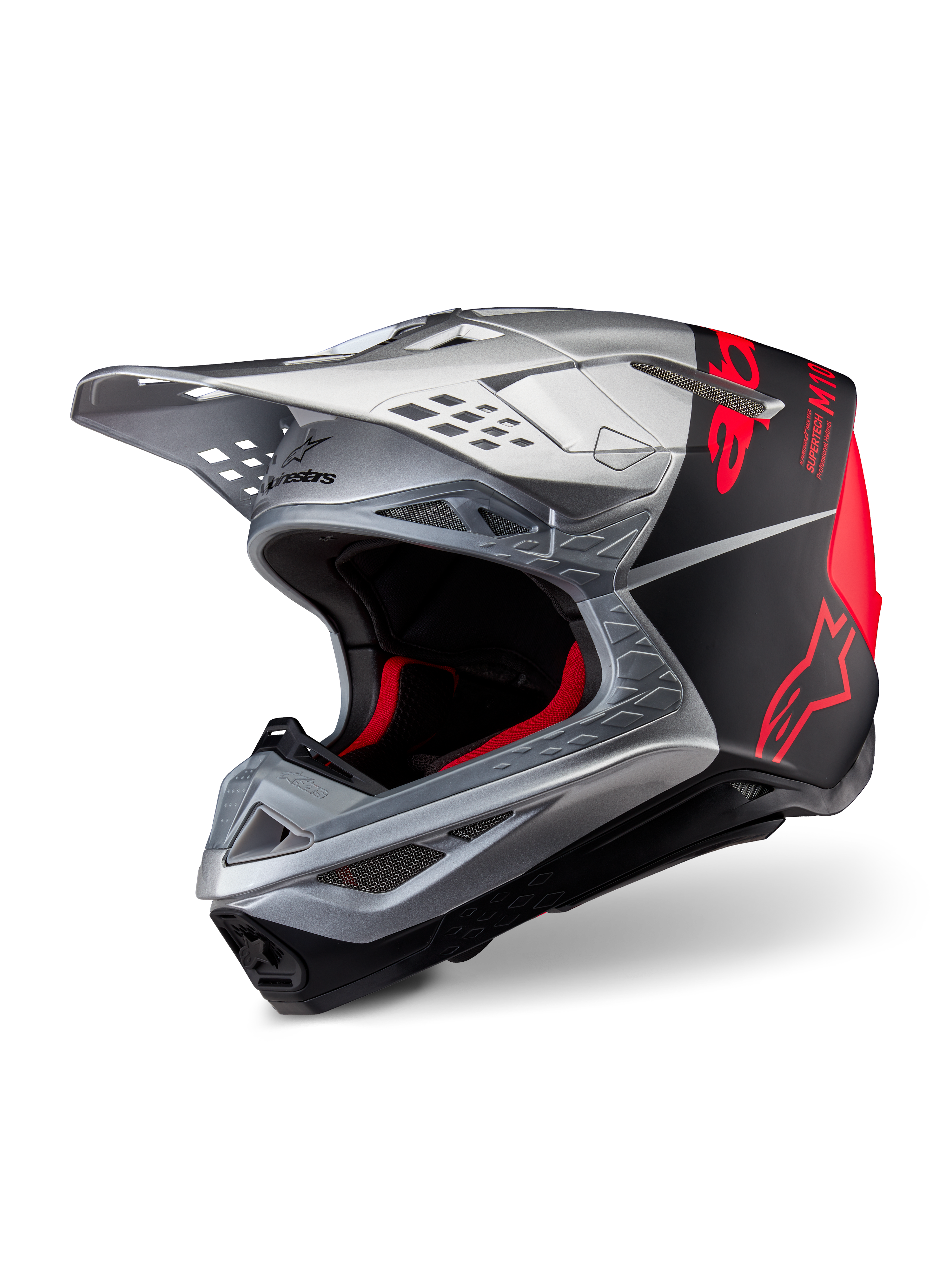 Alpinestars Supertech M10 Flood ECE 22.06 Helmet, Motocross Helmet, Silver Black and Orange Fluo, matte and glossy finish, featuring a sleek carbon shell with bold Alpinestars branding and multiple ventilation ports