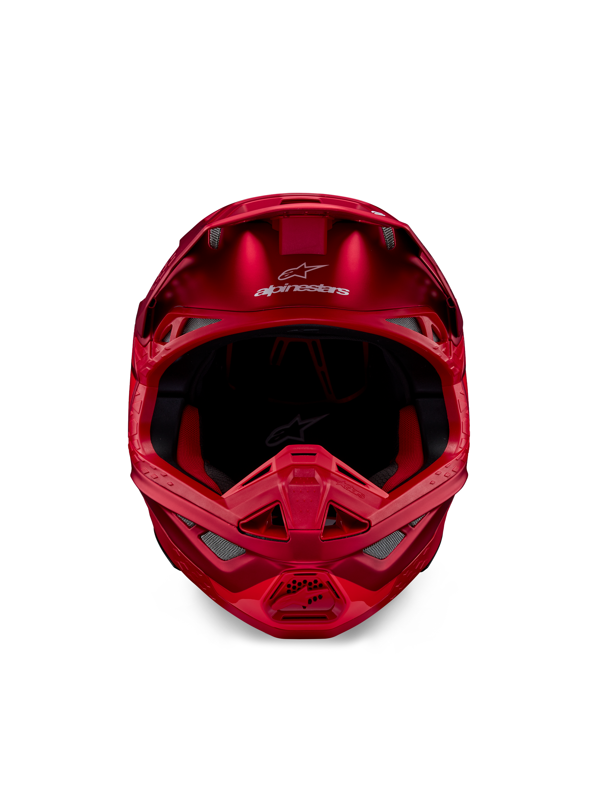 Casque Alpinestars Supertech M10 Flood, casque de motocross, rouge fluo et rouge mat/brillant, vue de face montrant un profil aérodynamique avec plusieurs prises d'air, logo Alpinestars sur le front et doublure intérieure rouge, équipement de course tout-terrain professionnel