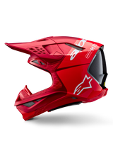 Casque Alpinestars Supertech M10 Flood ECE 22.06, casque de motocross, rouge et rouge fluo avec finition mate et brillante, vue de profil montrant le design aérodynamique de la coque, multiples orifices de ventilation et logo Alpinestars blanc.