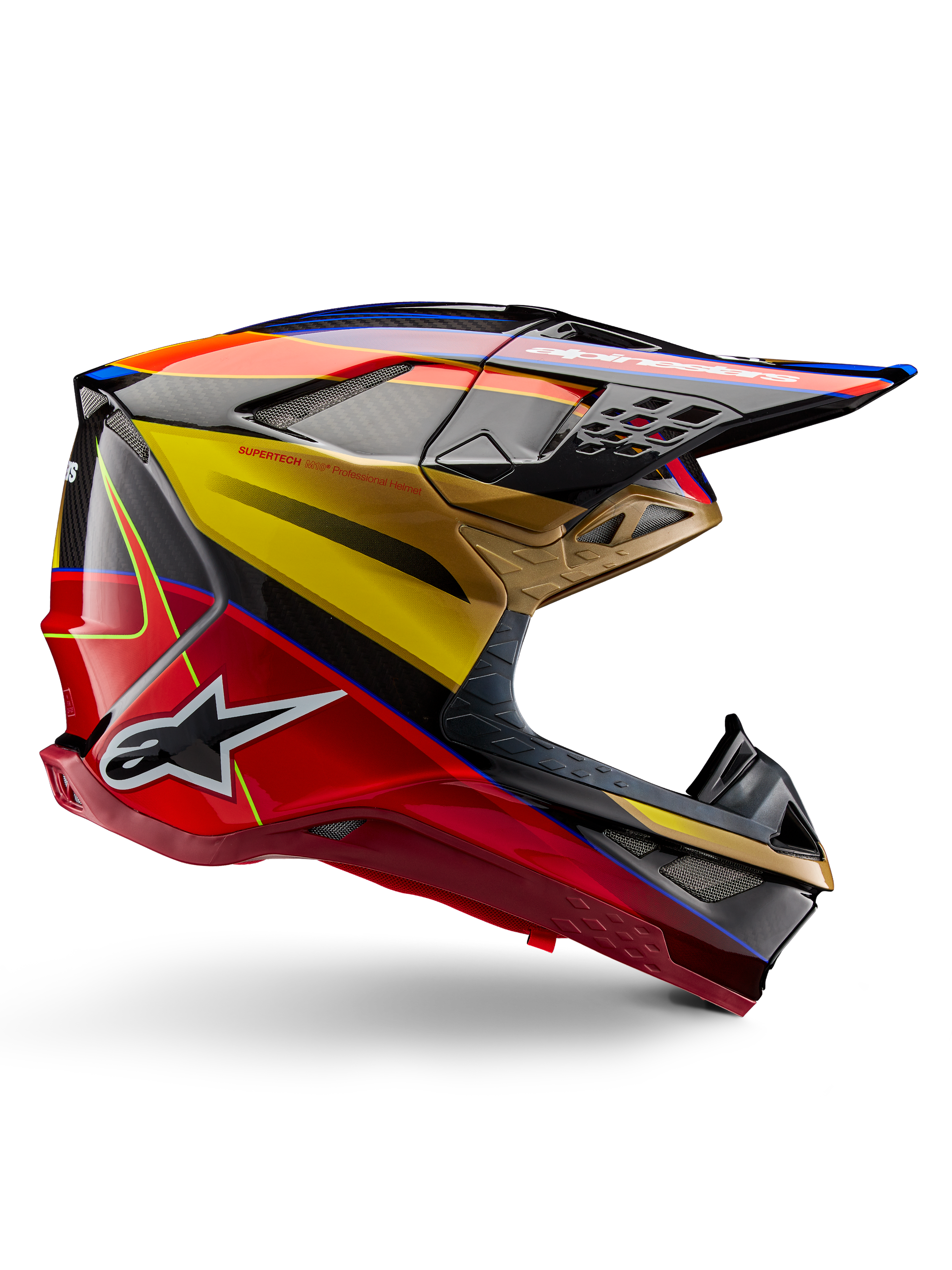 Casque Alpinestars Supertech M10 Era, casque de motocross, jaune doré et rouge Rio brillant avec accents bleus et noirs, design aérodynamique avec visière intégrée, multiples aérations avec mesh et détails en fibre de carbone, certifié ECE 22.06