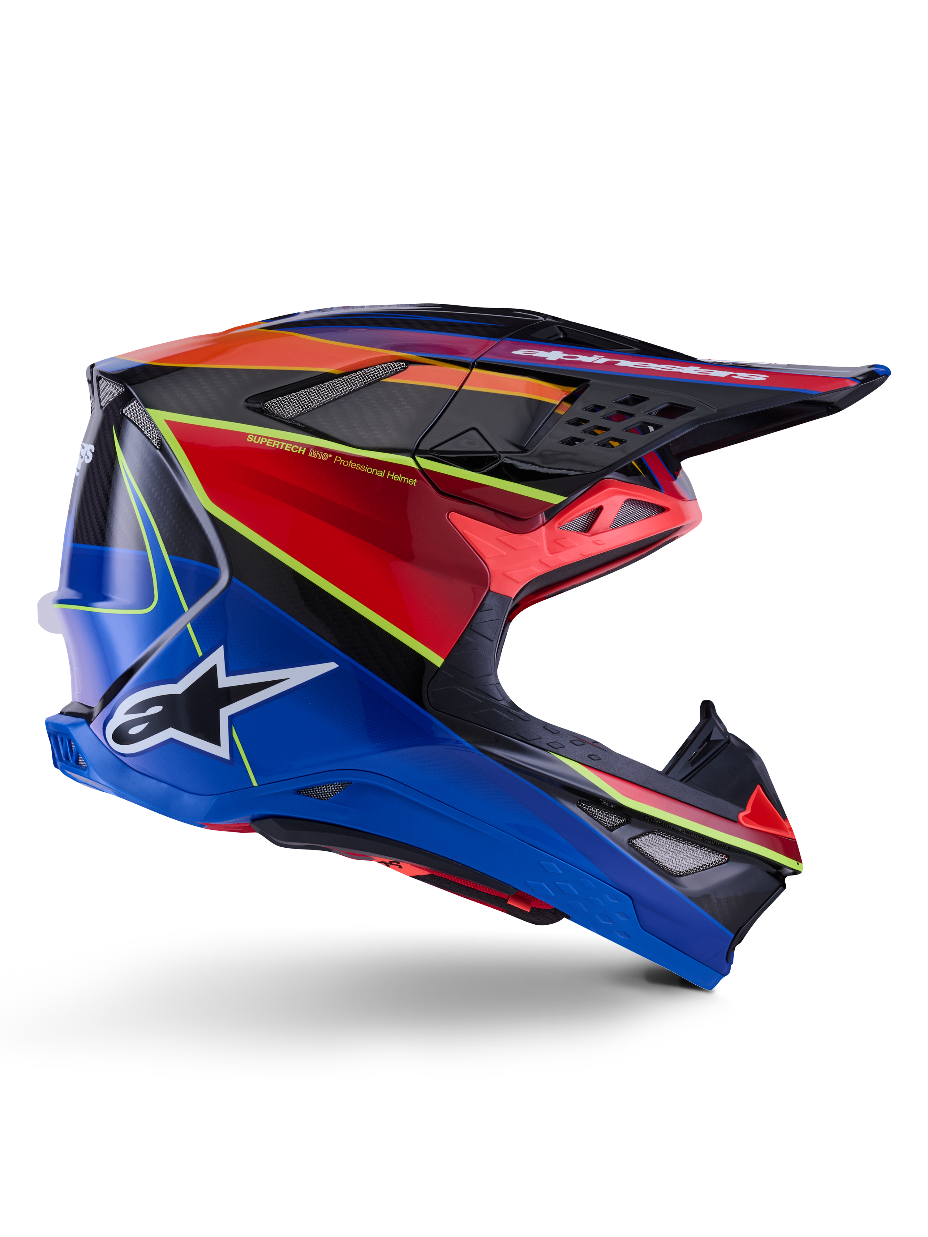 Casque Alpinestars Supertech M10 Era, casque de motocross, bleu, rouge et jaune fluo brillant, vue de profil montrant la coque en carbone multi-composite, logo Alpinestars blanc, design aérodynamique avec de nombreuses aérations pour la course tout-terrain