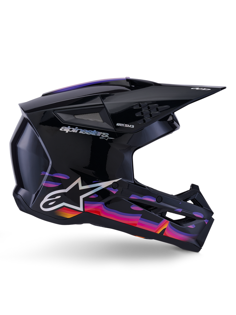 Alpinestars S-M3 Force OCD Helmet, casque de motocross, noir brillant avec motifs graphiques éclatants violets, roses et orange, vue de profil, arborant le logo Alpinestars argenté et le marquage SM3, conçu pour la performance tout-terrain