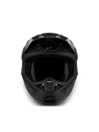 Alpinestars S-M7 Solid ECE06, casque de motocross tout-terrain, noir mat, certifié ECE 22.06, vue de face mettant en avant le design aérodynamique et les prises d'air.