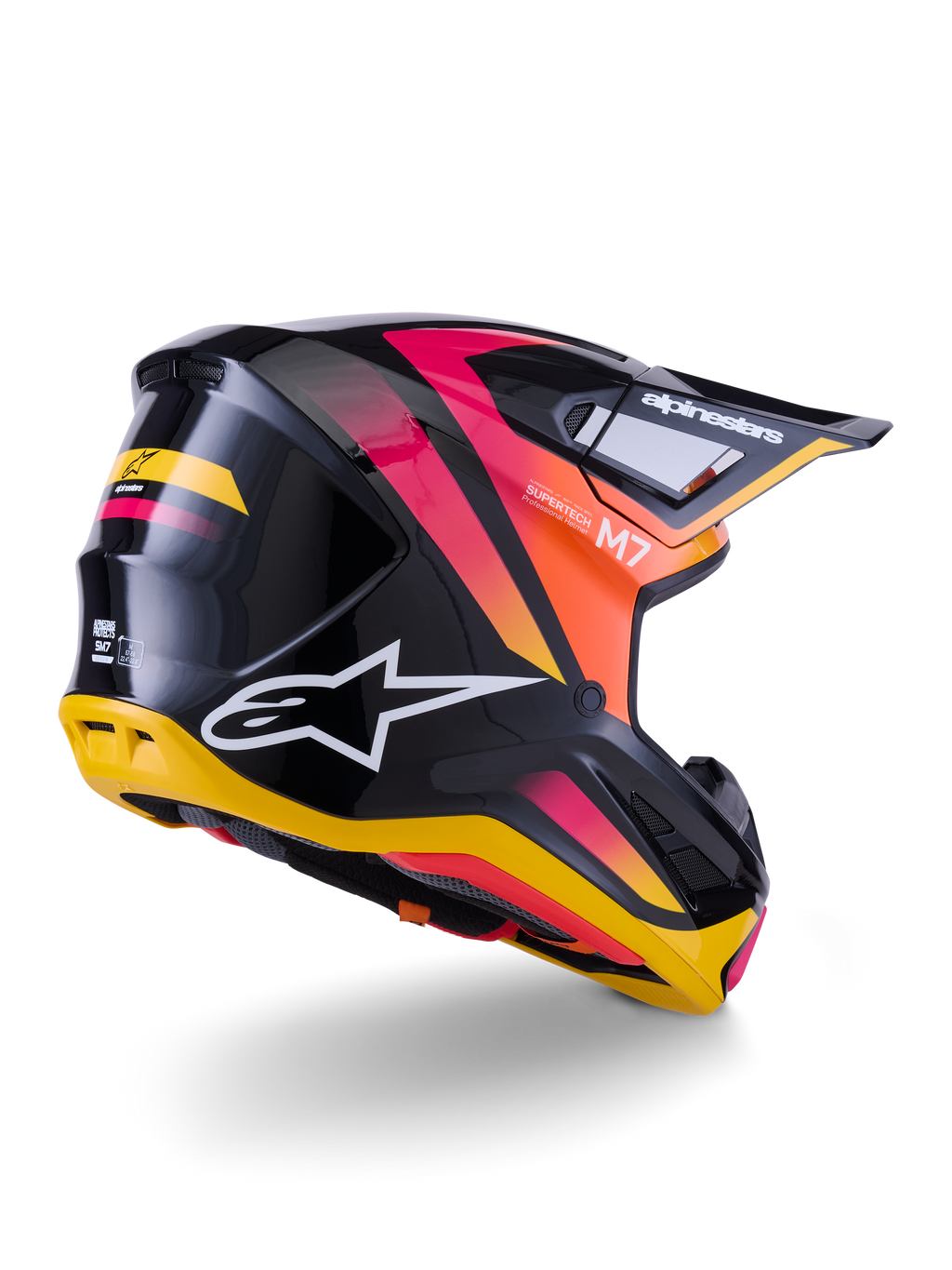 Casque Alpinestars S-M7 Rise, casque de motocross, noir, jaune et rose brillant, vue arrière et latérale présentant une coque composite aérodynamique avec des dégradés éclatants, des logos distinctifs et des ports de ventilation