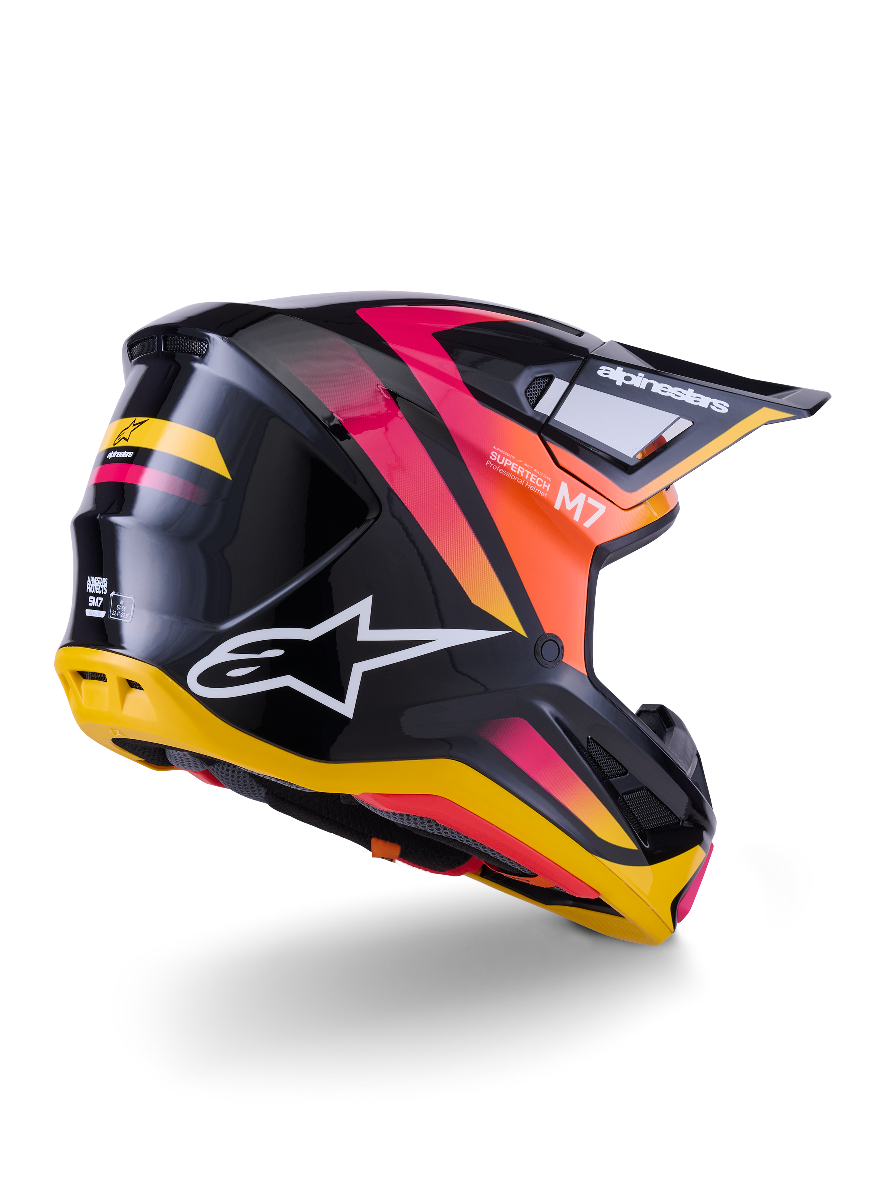 Casque Alpinestars S-M7 Rise, casque de motocross, noir, jaune et rose brillant, vue arrière et latérale présentant une coque composite aérodynamique avec des dégradés éclatants, des logos distinctifs et des ports de ventilation