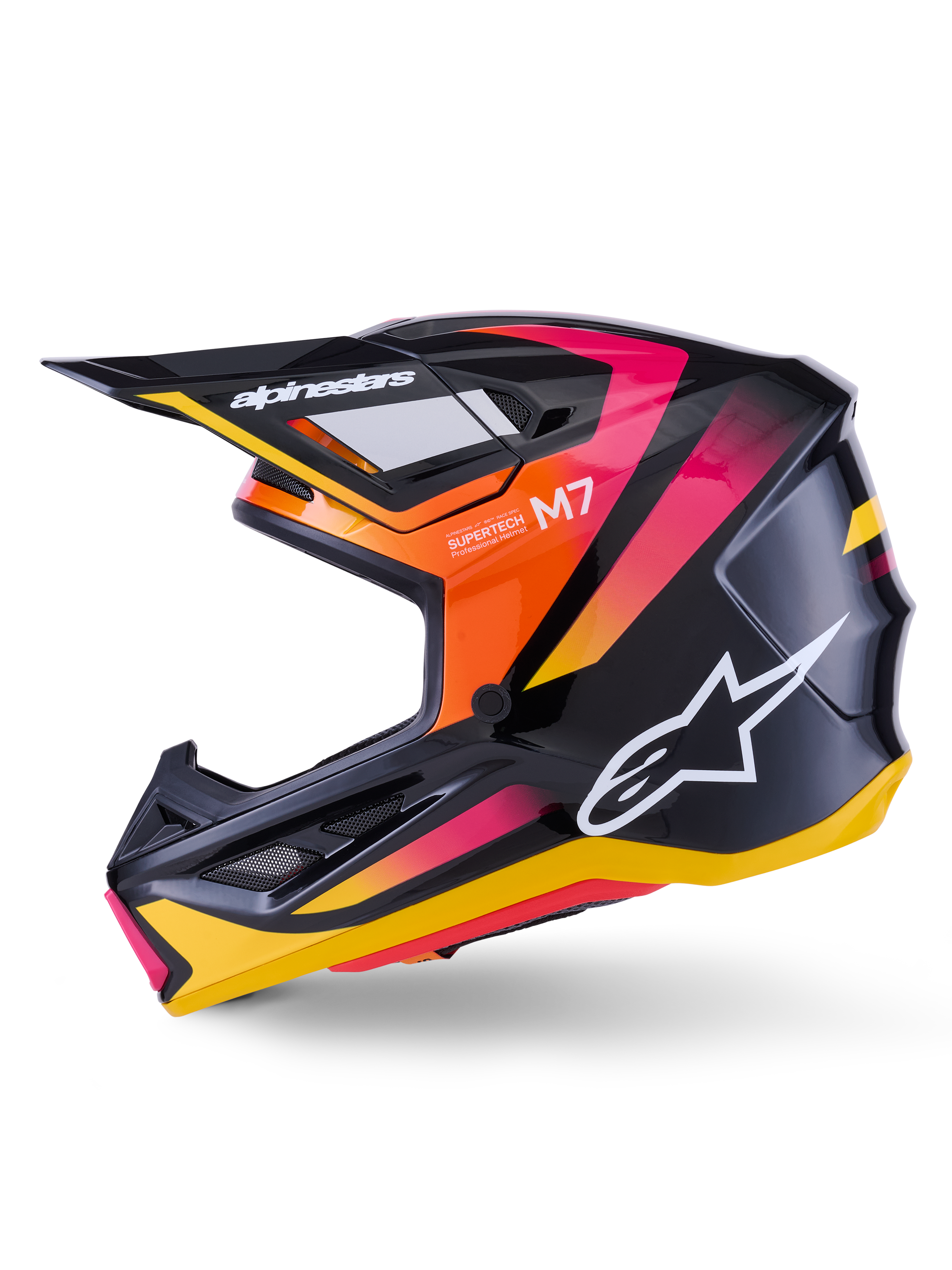 Casque Alpinestars S-M7 Rise, casque de motocross, noir, jaune et rose brillant, profil latéral montrant des accents dégradés orange et rose vifs, logo Alpinestars blanc, design aérodynamique épuré avec visière noire, protection de tête professionnelle pour la course tout-terrain