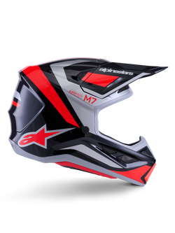Casque Alpinestars S-M7 Rise, casque de motocross, noir, argent et rouge fluo, vue latérale montrant un design aérodynamique angulaire avec visière et aérations, finition brillante, série Supertech M7