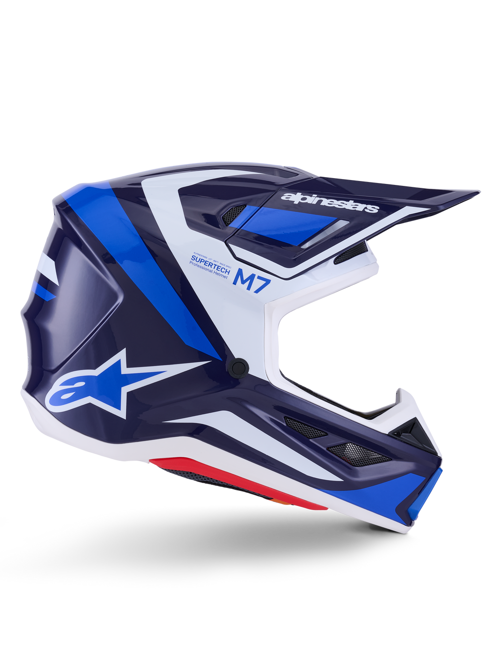 Casque Alpinestars S-M7 Rise, casque de motocross, bleu et blanc brillant, profil latéral présentant une coque composite aérodynamique, visière ventilée et design angulaire avec marquage audacieux, protection professionnelle tout-terrain