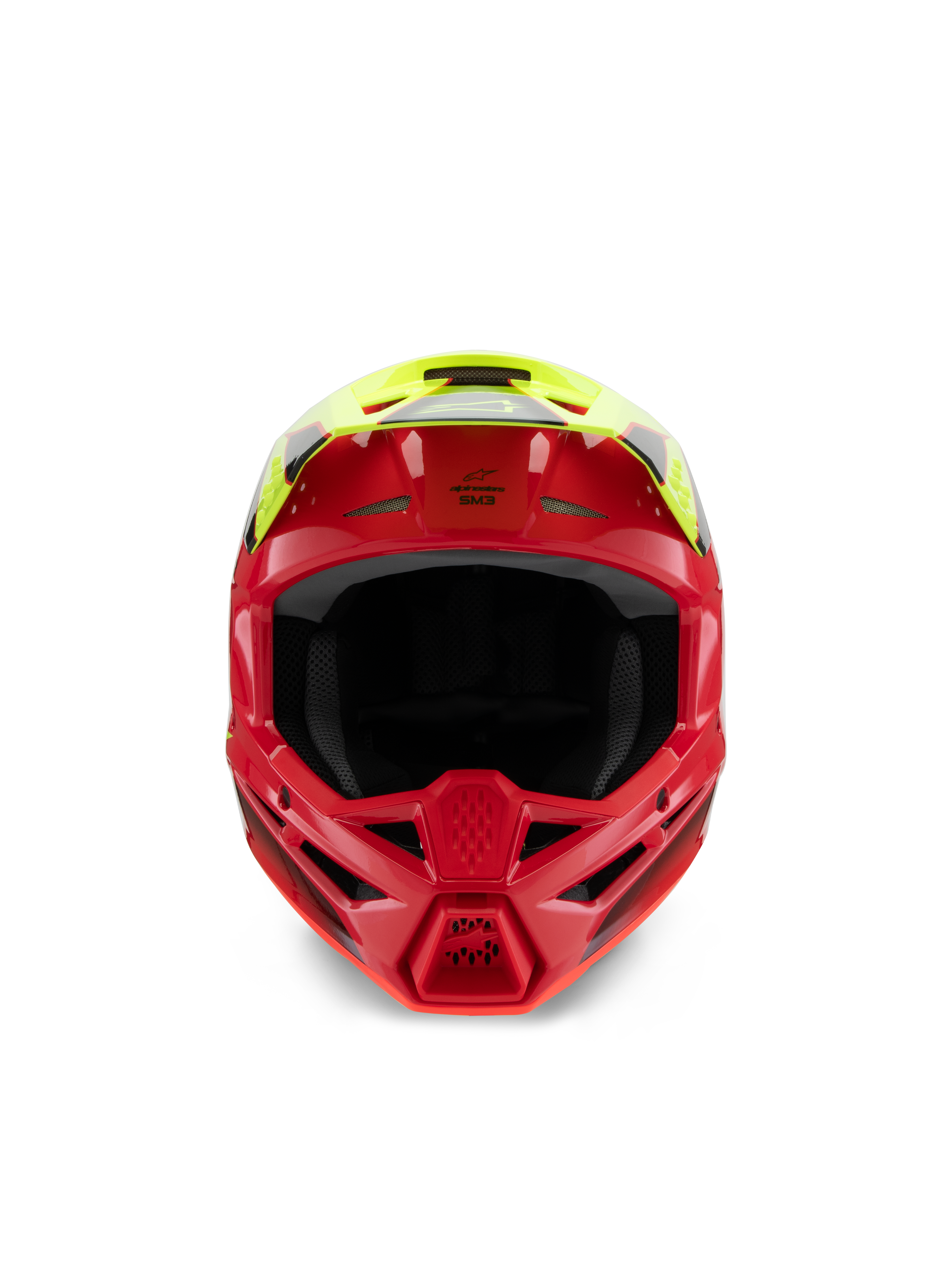 Casque Alpinestars S-M3 Junior Fray, casque de motocross, rouge et jaune fluo brillant, vue de face mettant en avant les entrées d'air et la mentonnière agressive, protection de tête spécialisée tout-terrain pour les jeunes pilotes