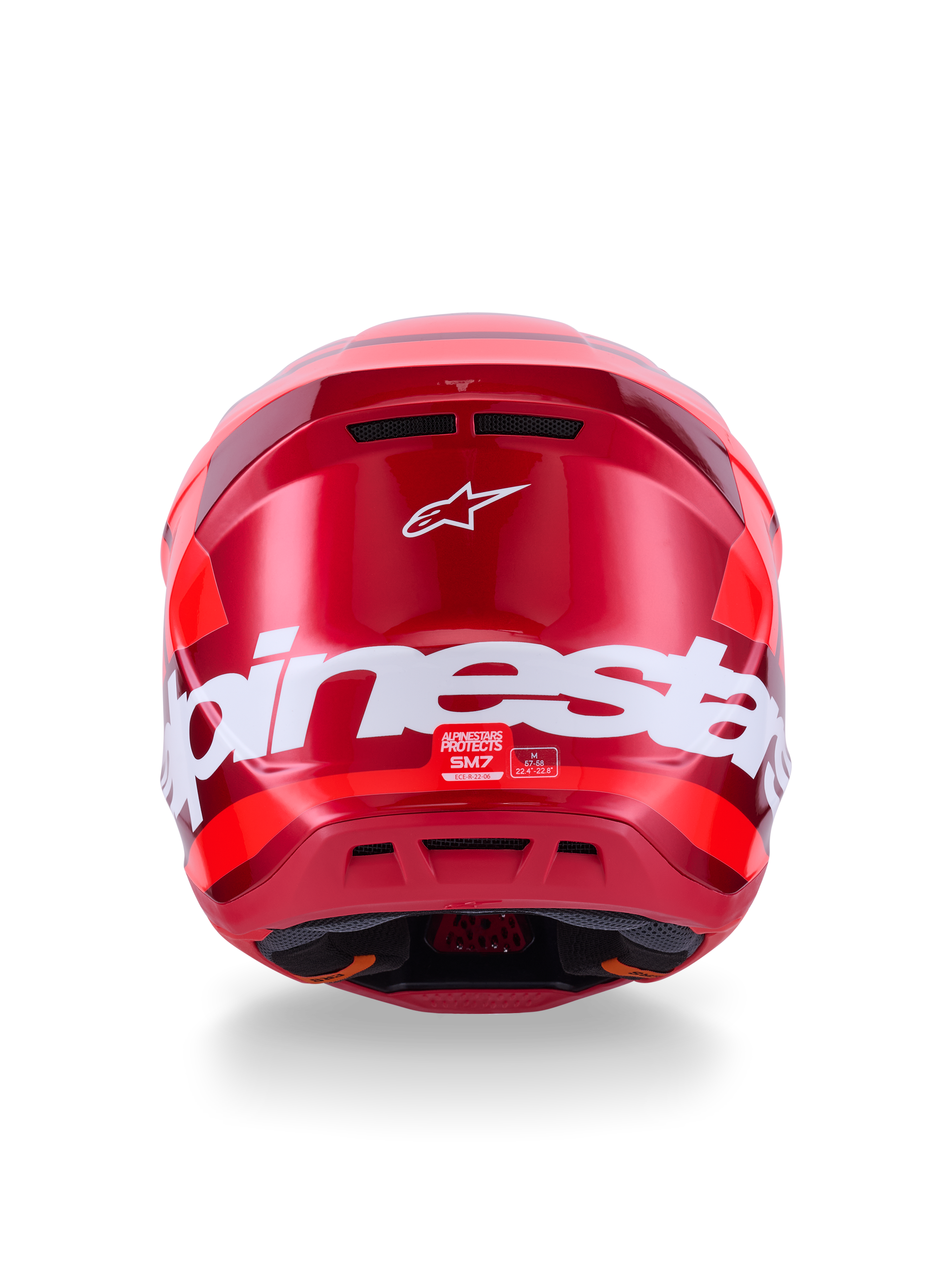 Alpinestars S-M7 Core Helmet, Red Glossy, Rear view with large white Alpinestars branding, aerodynamic shell with integrated ventilation ports, professional motocross head protection