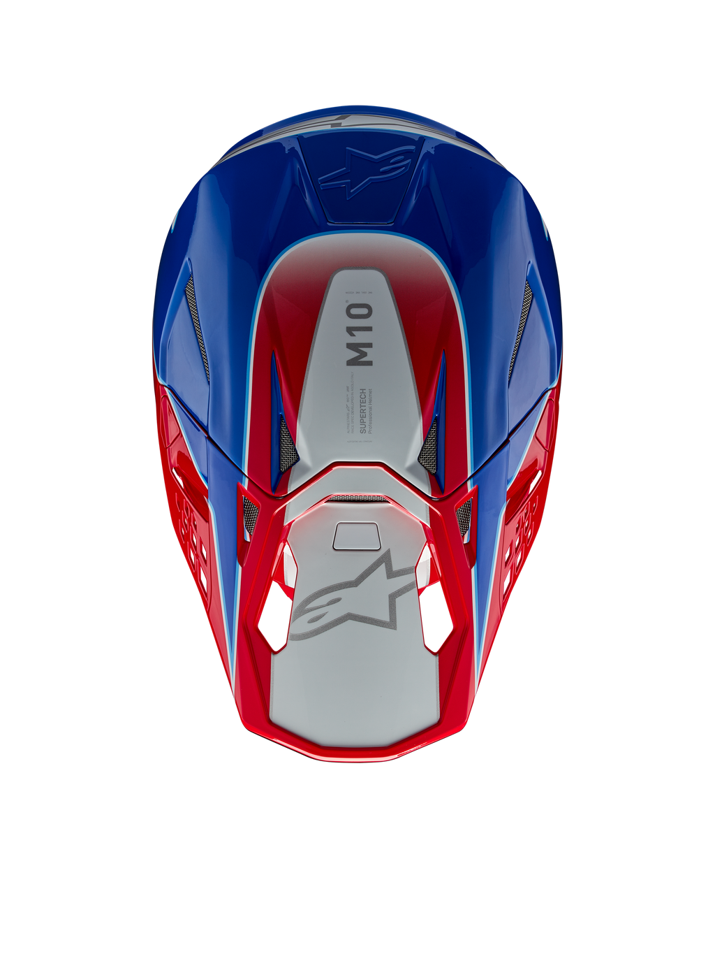 Alpinestars Supertech M10 Aeon Helmet, Motocross Helmet, Bright Red and Blue Glossy, top-down view showing silver central panel with M10 branding, aerodynamic shell with red and blue accents, mesh ventilation ports, high-performance motocross head protection